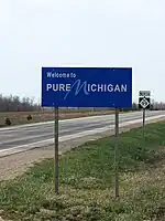 Welcome sign along M-99