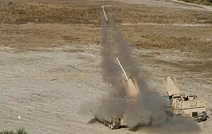 Marines with 2nd Combat Engineer Battalion launch a M58 MICLIC from an M1150 Assault Breacher Vehicle