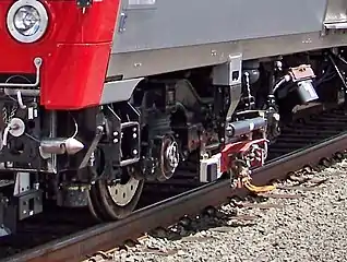 Contact shoe on Metro-North M8 railcar, designed for both over- and under-running third rail.