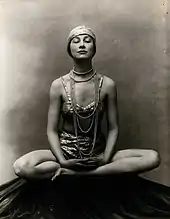 In "Buddha position", Muktasana. Photograph by John de Mirjian, c. 1928