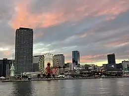 View of MOSAIC and Meriken Park from ferry at dusk (2022)