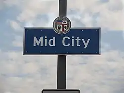 Mid City neighborhood sign  located at the intersection of La Brea Avenue and the Santa Monica Freeway