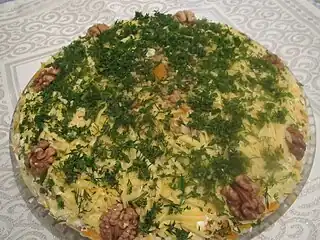 Mimosa salad, decorated with dill