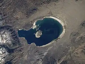 The eutrophication of Mono Lake, which is a cyanobacteria-rich soda lake