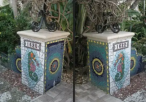 The entrance of the building decorated with seahorse mosaics