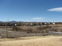 Houses in Westminster with the Front Range in the background.