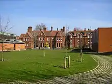 The rear garden, with the original East Thorpe House in the centre