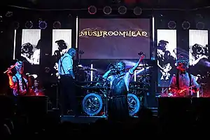 Performing in 2013. From left to right: Robbie Godsey, Tom Schmitz (far background), Waylon Reavis, Steve Felton (barely visible), Jeffrey Hatrix & Rick Thomas.