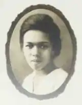 A young African-American woman, in an oval frame.