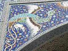 Phoenix on the portal of Nadir Divan-Beghi Madrasah, Bukhara, Uzbekistan