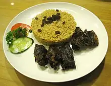 Nasi kebuli with goat meat.