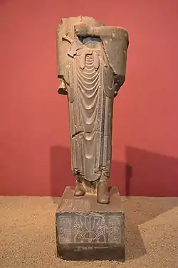 Statue of Darius, with a quadrilingual inscription at its base