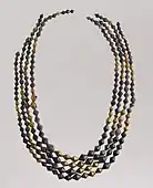 Sumerian necklace beads; 2600–2500 BC; gold and lapis lazuli; length: 54 cm; Metropolitan Museum of Art (New York City)