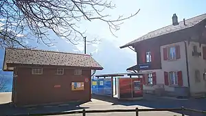 Three-story building with gabled roof