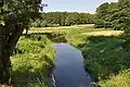 The Niemica River flowing north, in the countryside.