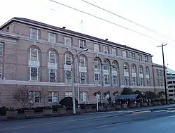 The old immigration building at the northern end of the neighborhood on Airport Way S.