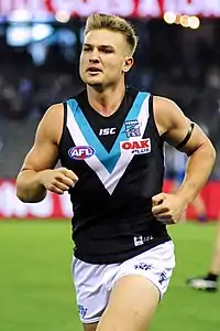 Ollie Wines running in 2018