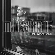 The album cover depicts Miles Kane looking outside of a window