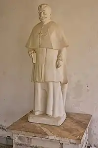 Sculpture of Preng Doçi in the portico of Orosh Church (2018)