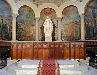 Statue  of the Virgin Mary by Henri-Albert-Marie Lagriffoul, in the Choir in front of the "Crucifixion" fresco