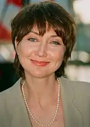 A head shot of country music singer Pam Tillis.