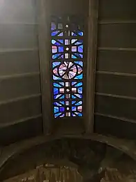 Glass in ceiling vault over the collateral aisle