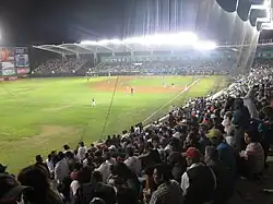 photo of stadium interior during a night time game