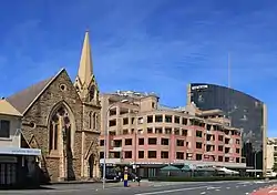 colour photo of a church in an urban setting