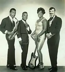 Publicity photo of Pearl Reaves and the Paul Farano Trio taken in the 1960s. Robert Green, Eddie Shaw, Pearl Reaves Farano, Paul Farano.