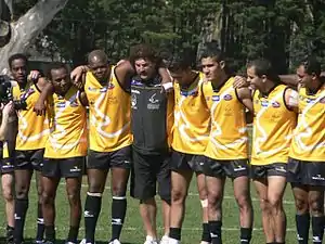 Robert Dipierdomenico coach of the Peres Peace team joining with his team to sign the joint anthem