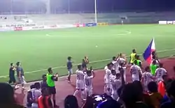 Parading Philippine national team players celebrating their win and thanking fans in attendance