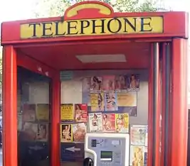 Image 19Tart cards in a British phone box advertising the services of call girls (from Prostitution)