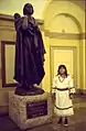 Native woman with statue, Washington, D.C.