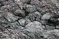 Pillow structures preserved in greenschist-facies metamorphosed basalts of the FranciscanComplex, Black Sands Beach, Marin Headlands, California. Field of view is approximately 2 m wide.