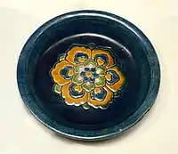 A round sancai dish from the Tang dynasty, 8th to 9th century