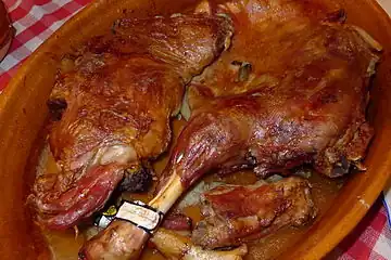 Lechazo asado (roast lamb), shown above, is a typical dish from the province of Valladolid and other Castilian provinces in Spain.