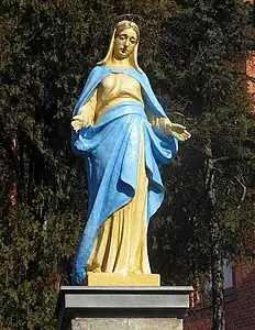 Statue of Virgin Mary of the Immaculate Conception in front of the church, by Piotr Triebler