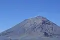 December 2014 View of the glacier seen from one of the slopes of Iztaccihuatl, the black coloration of the glaciers and the snow is caused by the constant fumaroles of the volcano previous months.