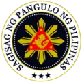 Under the government of President Corazon Aquino, the seal was restored to the Galo Ocampo original but with Filipino text; this seal would be in general use.