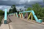 Pony truss bridge of reinforced concrete