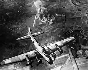 8th Air Force Boeing B-17 Flying Fortress during raid of October 9, 1943 on the Focke-Wulf aircraft factory at Malbork, Poland (Marienburg in German).