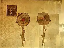 Some of the Juliusbanner given by pope Julius II to the Swiss cantons and their associates included augmentations or "improvements"; shown here is the banner of Rapperswil, with the two roses of the city's coat of arms rendered in gold instead of the usual red.