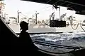 Moving pallets into the hangar of a Nimitz-class aircraft carrier in 2009.