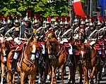 The cavalry regiment of the Republican Guard opening the motorised parade (formerly cavalry parade)