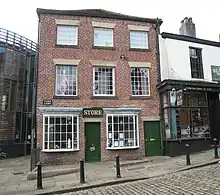 Photograph of the original Rochdale Pioneers shop, now home to the Rochdale Pioneers museum.