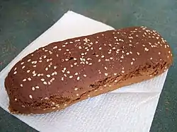 Roti gambang, xylophone-shaped bread with sesame seeds.