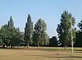 SHAEF memorial in foreground with USAAF memorial among the trees