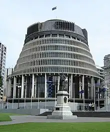 A circular, latticed building resembling a natural beehive (skep).