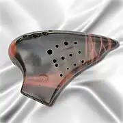 A triple-chambered ocarina in the bass register