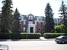 The former Sacred Heart Academy, now converted to private condominium-title residences, but also housing the Roman Catholic Synod Office.